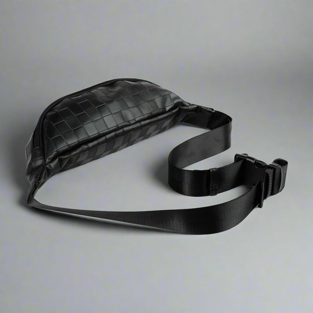 Black waist bag with a strap on a white background