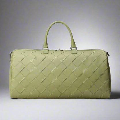 Green woven duffel bag on a white background