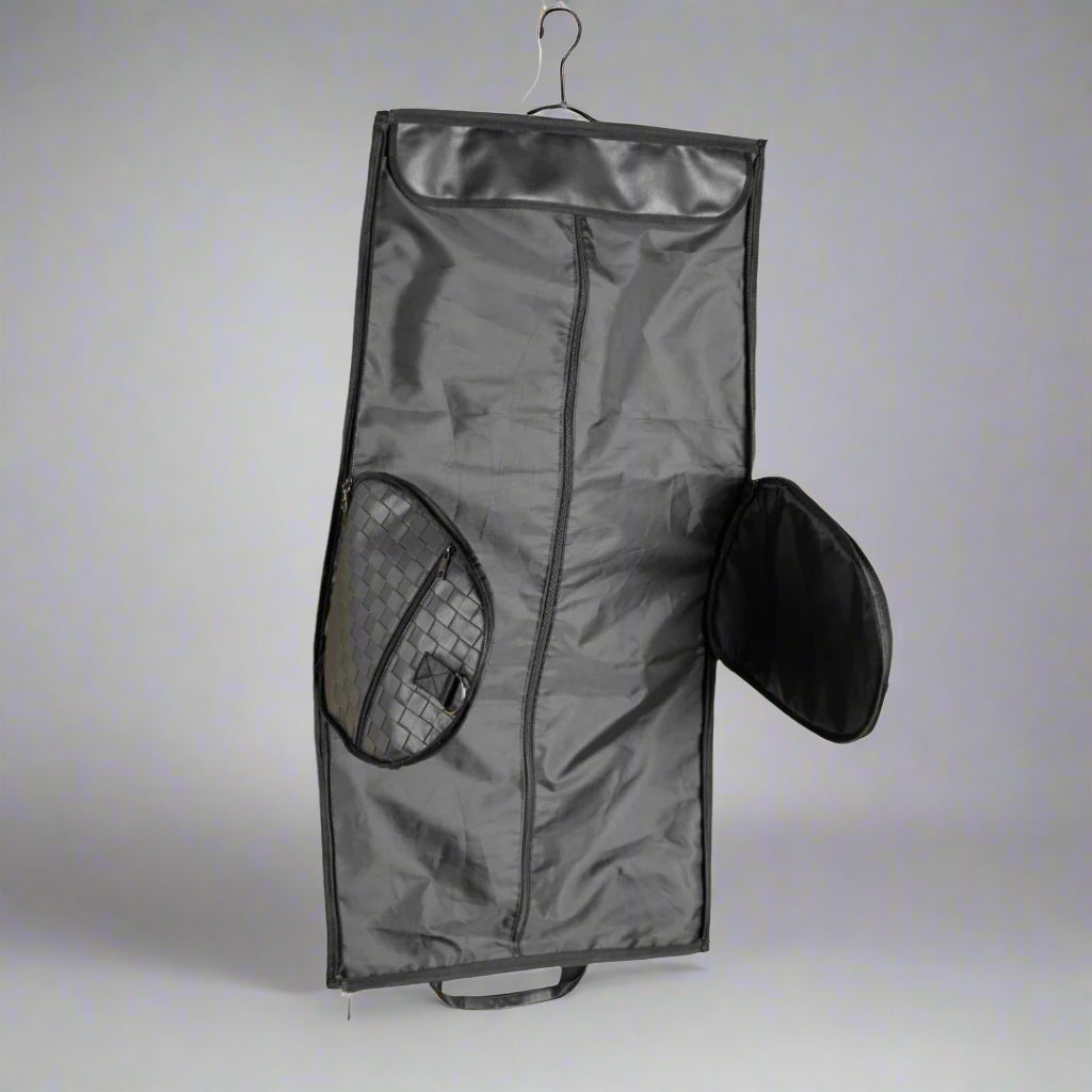 Black garment bag with a shoe compartment on a white background