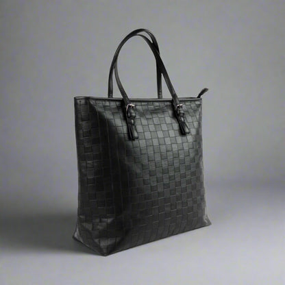 Black woven tote bag on a white background