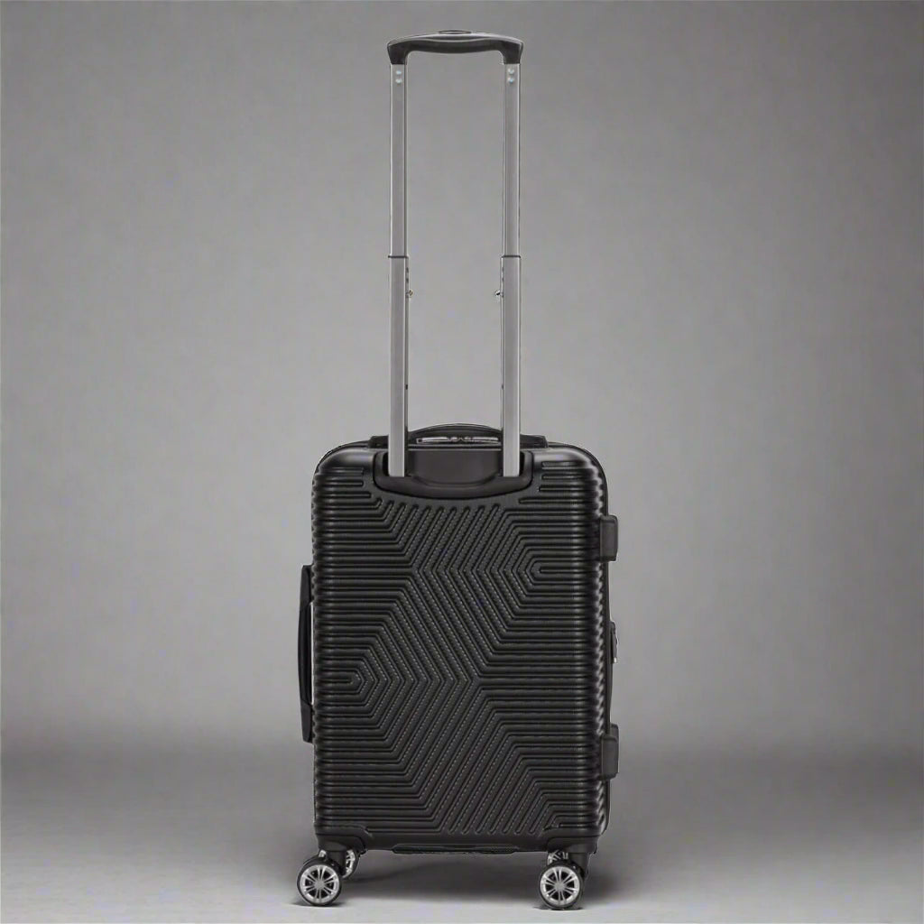 Black suitcase with geometric pattern on a white background