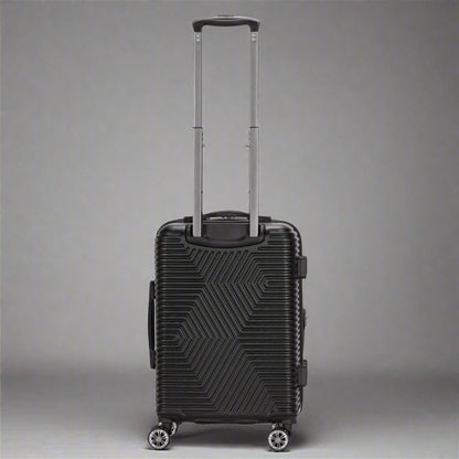 Black suitcase with geometric pattern on a white background
