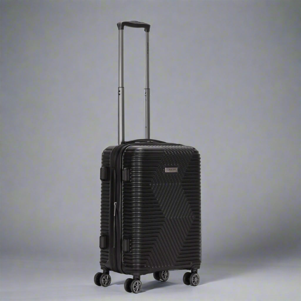 Black suitcase with a geometric pattern on a white background