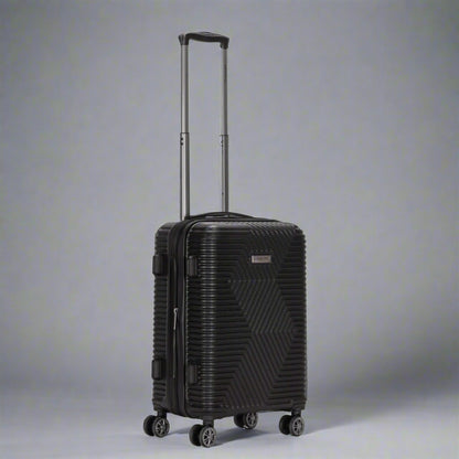 Black suitcase with a geometric pattern on a white background