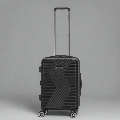 Black suitcase with geometric pattern on a white background