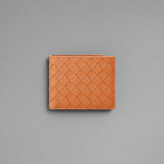 Orange woven leather wallet on a white background