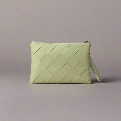 Light green woven clutch bag on a white background