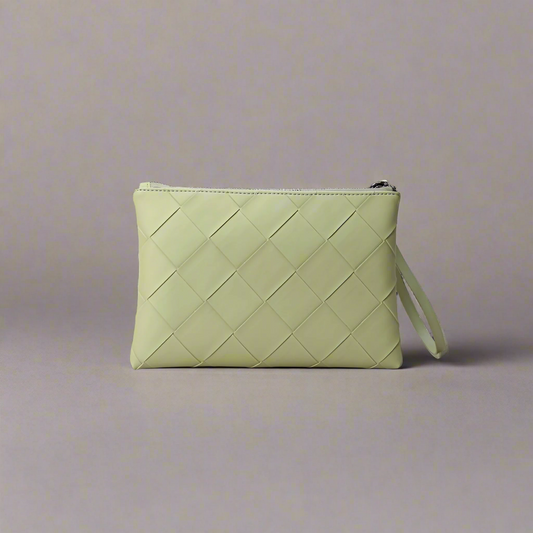 Light green woven clutch bag on a white background