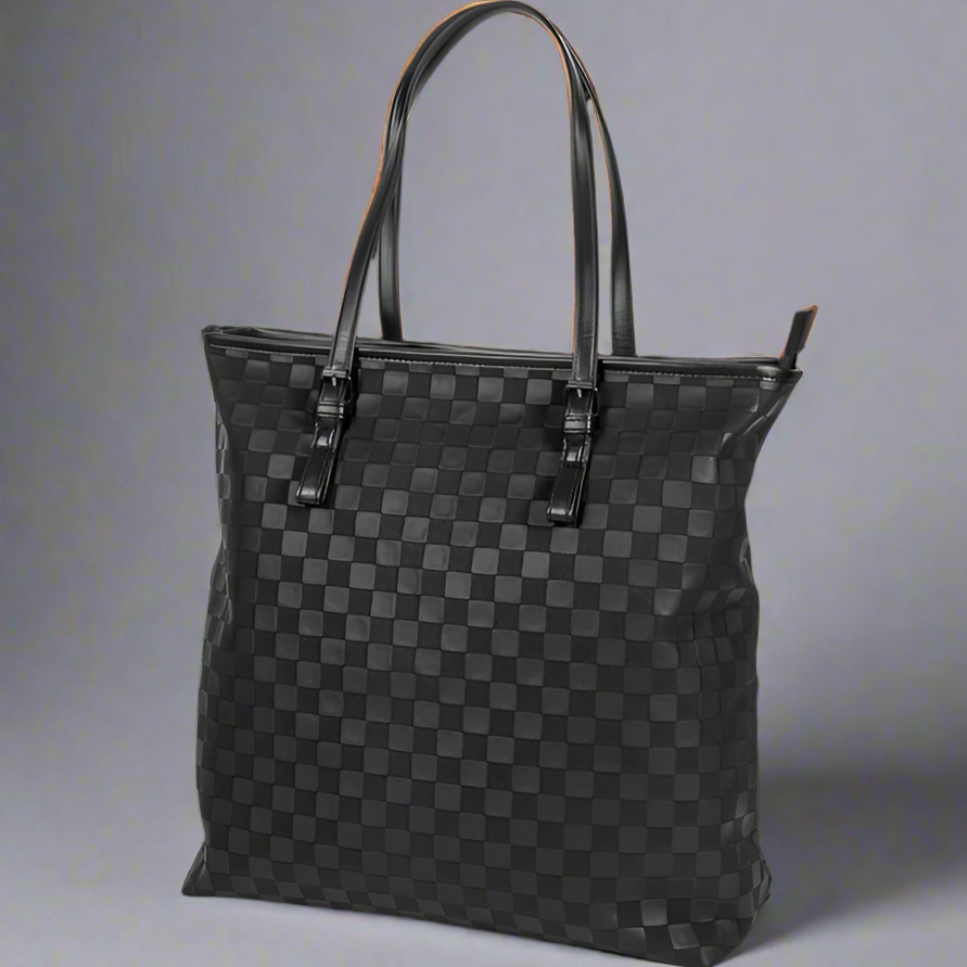 Black checkered handbag on a white background