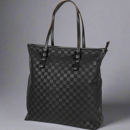 Black checkered handbag on a white background