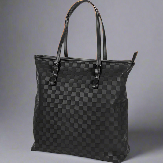 Black checkered handbag on a white background